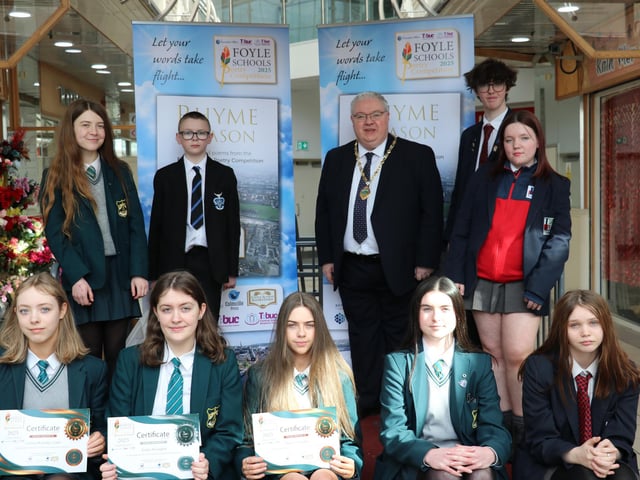 Deputy Mayor Darren Guy with a selection of winners from the Foyle chools Poetry Competition at Rath Mor.