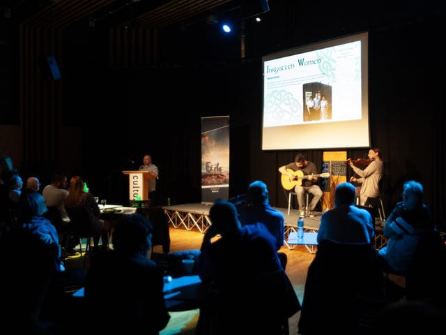 Colm Barton addressing the attendance at the 'Consider The Women of Ireland' Féile 23 event at An Cultúrlann on Sunday night.