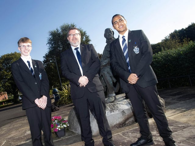 Mr. J. Johnston, Vice Principal, St. Columb's College pictured with the top two high achieving GCSE students on Friday morning. Ben Crawley and Ramez Abdelsayed. (Photos: Jim McCafferty Photography)