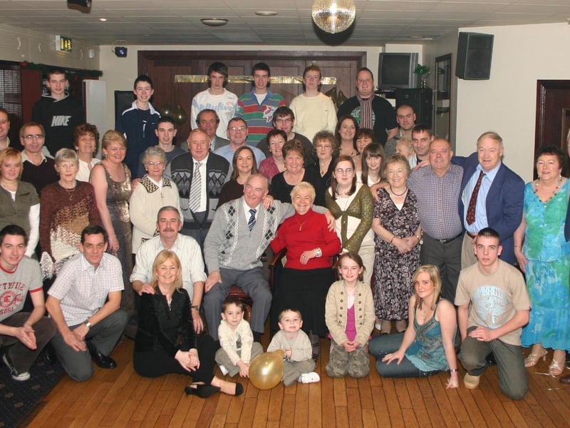 Shelia and Eddie O Donnell surrounded with their friends and family at the Golden Wedding Anniversary in Pitchers. 1983/dd : .