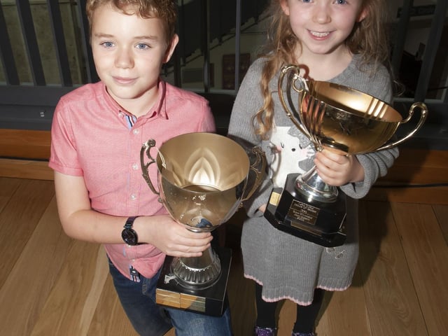 Siblings Cillian McGurk, winner of P6 Boys and Nessa McGurk, winner of the P2 girls awards at the Foyle School of Speech and Drama Annual Charity Feis on Saturday.