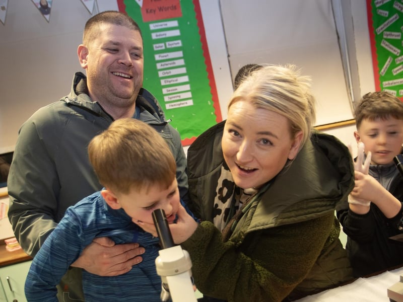 Mum and dad help out as the Dean family (Long Tower PS) have some fun in the Biology Department at St. Joseph's Boys School on Tuesday night.
