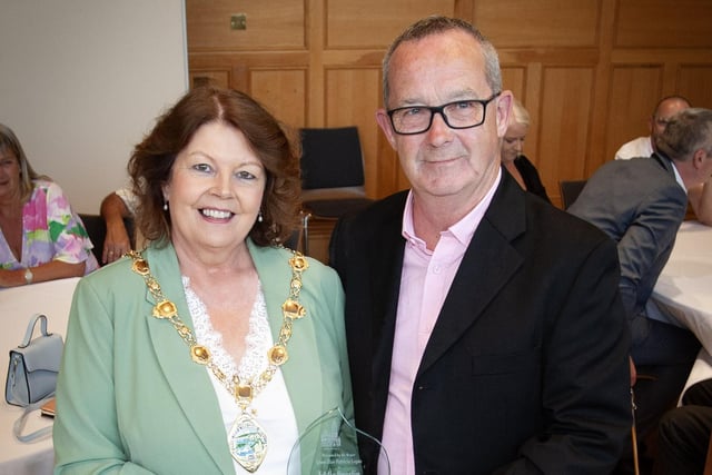 The Mayor of Derry City and Strabane District Council Patricia Logue makes a presentation to Eddie Breslin, in recognition of his retirement from the Housing Executive and his contribution to housing in the city and district, at a special function in the Guildhall on Thursday evening. (Photos: JIm McCafferty Photography)