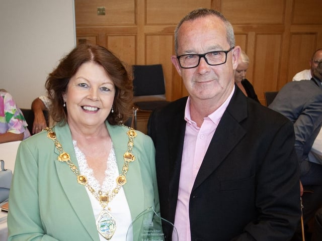 The Mayor of Derry City and Strabane District Council Patricia Logue makes a presentation to Eddie Breslin, in recognition of his retirement from the Housing Executive and his contribution to housing in the city and district, at a special function in the Guildhall on Thursday evening. (Photos: JIm McCafferty Photography)