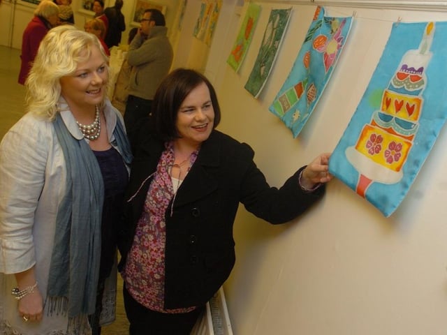 Paula McGurk and Caroline Devenney pictured at the Women Building Bridges exhibition at the Eden Place Arts Centre held as part of international Women's day. (1103SL07)