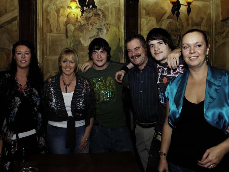 Aaron and Colin pictured with their family Jucinta, Veronica, Geard and Laura.