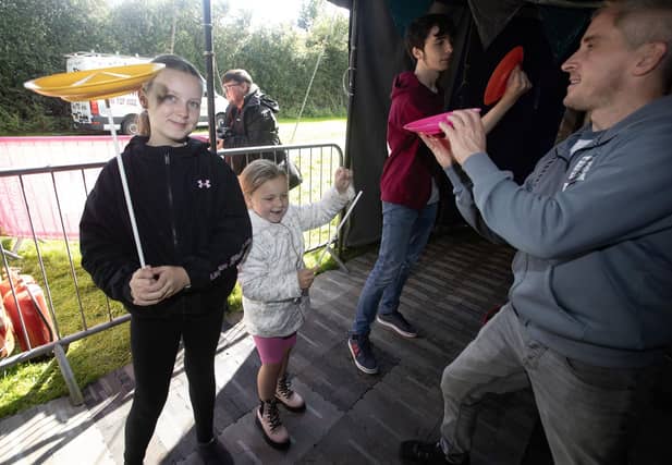 Children taking part in one of the many circus workshops at Saturday's Waterside Together Festival. : .