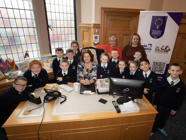 The Mayor of Derry City and Strabane District Council, Patricia Logue pictured in the Mayor's Parlour with pupils from the Long Tower Primary School during their Democracy Week visit to the Guildhall on Thursday morning.