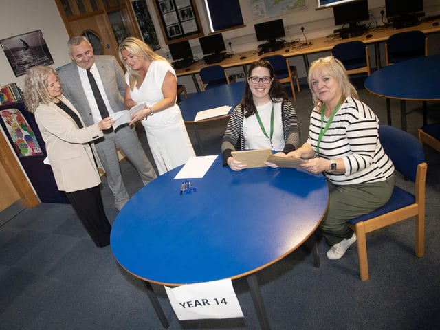 BUSY DAY AHEAD!. . . .Getting ready for A Level results on Thursday morning at St. Joseph's Boys School are, from left, Mrs. Fiona Harrigan, Mr. Gerry Beattie, Mrs. Ciara Deane, Ms. Catherine Mullan and Mrs. Cecilia McDevitt. (Photos: Jim McCafferty Photography)