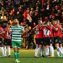 Derry City FC celebrate before a cast of thousands at the Brandywell.