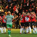 Derry City FC celebrate before a cast of thousands at the Brandywell.
