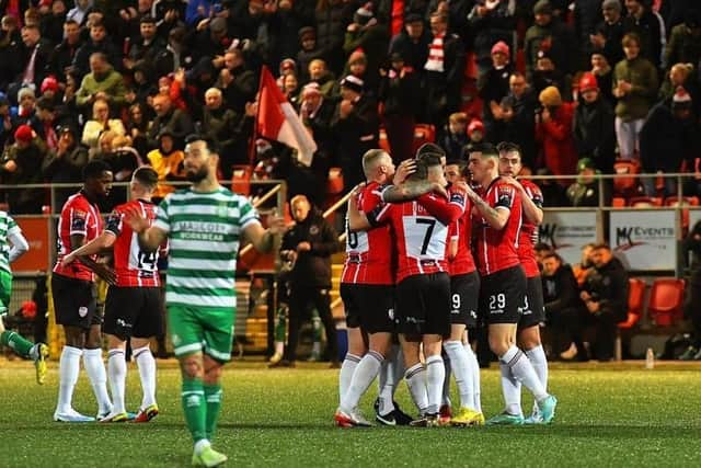 Derry City FC celebrate before a cast of thousands at the Brandywell.