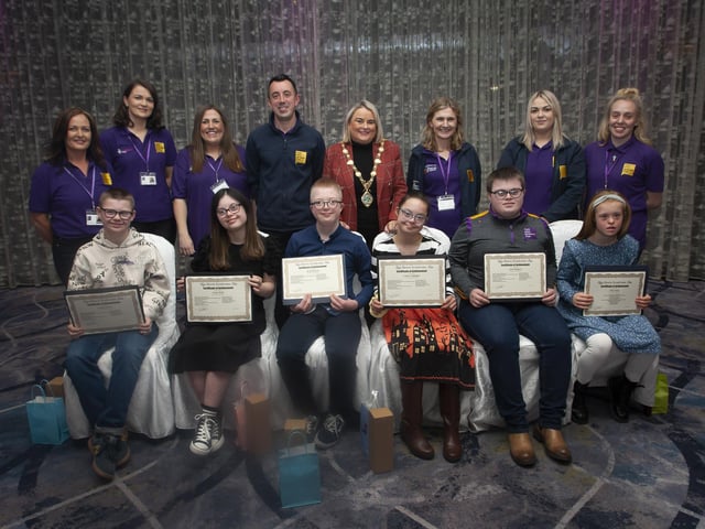 Members of the 13-19 year old group receiving their certificates at the FDST Celebration of Achievement Event on Tuesday night.