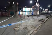 Police tape at damaged fencing outside the Waterside railway station in Derry.