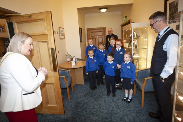 The Mayor of Derry City and Strabane District Council, Sandra Duffy pictured welcoming pupils from St. Paul’s PS School Council, Slievemore, Derry to the Guildhall on Monday morning last. At back is Principal, Mr. Gareth Blackery. (Photos: Jim McCafferty Photography)