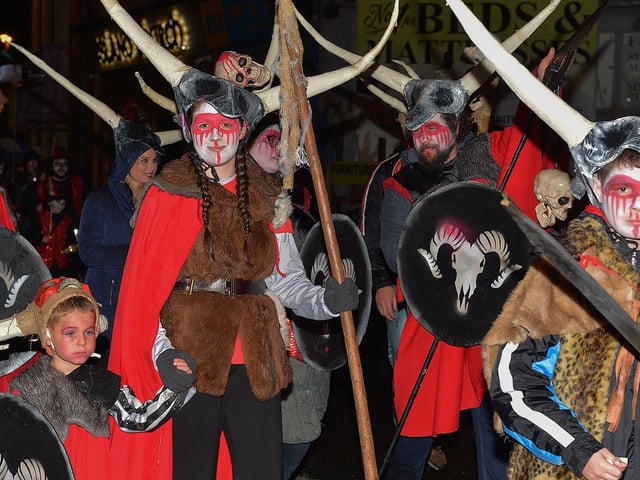 Participants in the Halloween carnival parade ‘On the Ninth Wave’ make their way along the Strand Road on Monday evening.  Photo: George Sweeney.  DER2244GS – 087