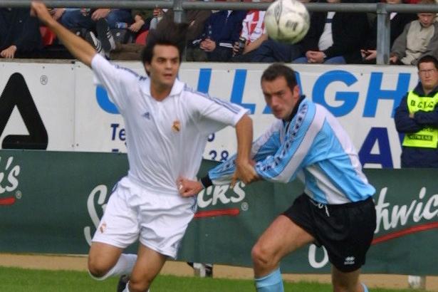 Derry's Paddy McLaughlin holds back Manu of Real Madrid.(2208JB76)