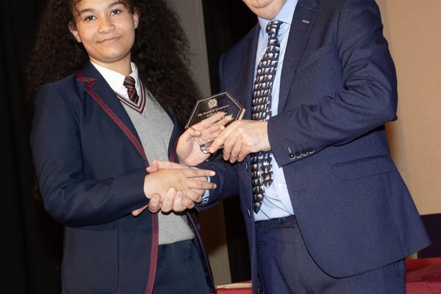 Mr. John Harkin, Principal, Oakgrove Integrated College, pictured presenting the Board of Governors award to Caoimhe.