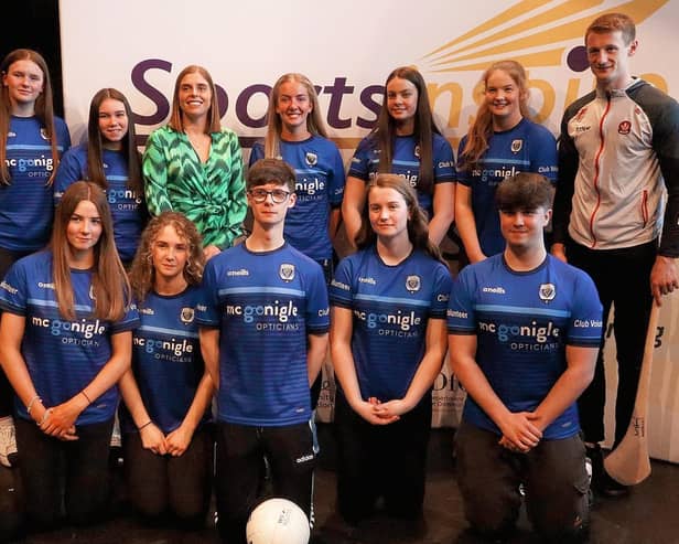 John Mitchel's, Claudy's 'Sports Inspire' award winners who were presented with their Ulster GAA certificates for 50/100/200 hours volunteering at an awards ceremony in The Mac in Belfast last week. Volunteers are pictured along with Derry All Star midfielder Brendan Rogers and Ireland Hockey Player and Eoghan Rua camog, Katie Mullan.