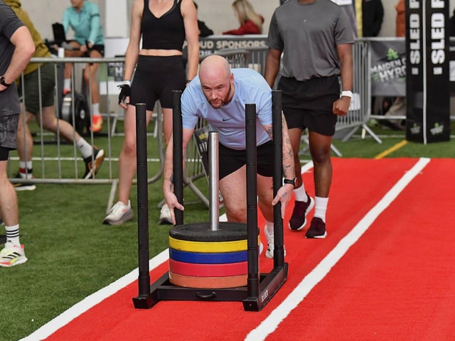 Competitor takes part in ‘Sled Push’ during the Maiden City Hyrox V Fitness Challenge held at Sean Dolans GAC on Saturday.  Photograph: George Sweeney