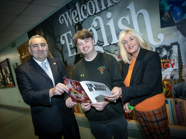 WELL DONE GARY!. . . .Mrs. Ciara Deane, Principal and Mr. Gerry Beattie, Vice Principal, St. Joseph's Boys School congratulating former pupil and current classroom assistant Gary Breslin on the success of his debut play 'The Body of Bobby' which played to packed audiences over the weekend at the Millennium Forum, Derry. (Photos: JIm McCafferty Photography)