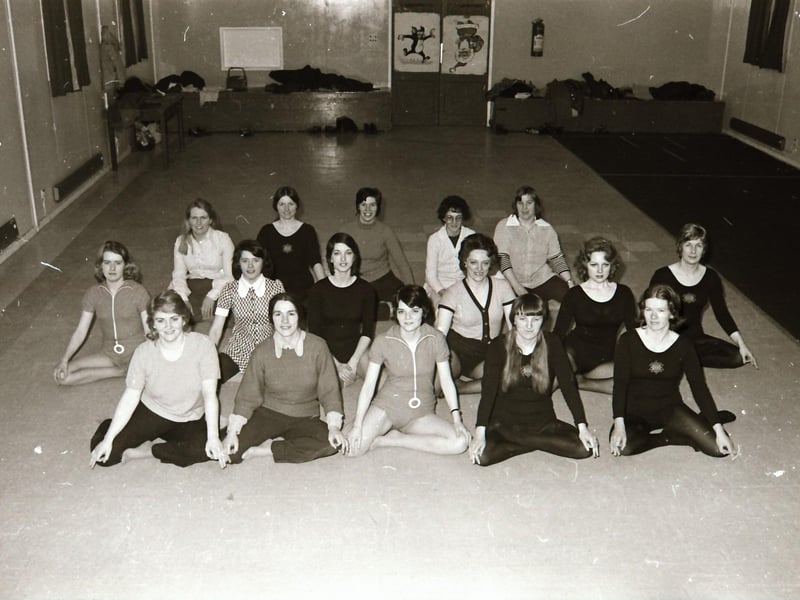 Derry women doing a yoga class at Shantallow Women's Club in Shantallow Community Centre.