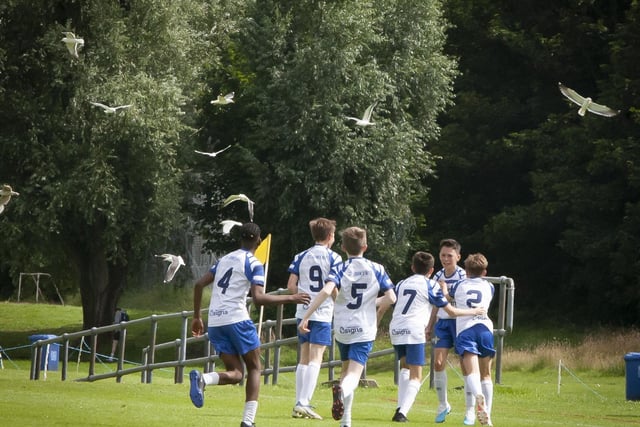 CELEBRATING WITH THE BIRDS!. . . .St. John’s Athletic players celebrate the opening goal against HIllsborough Boys at Templemore on Monday evening. (Photos: Jim McCafferty Photography)