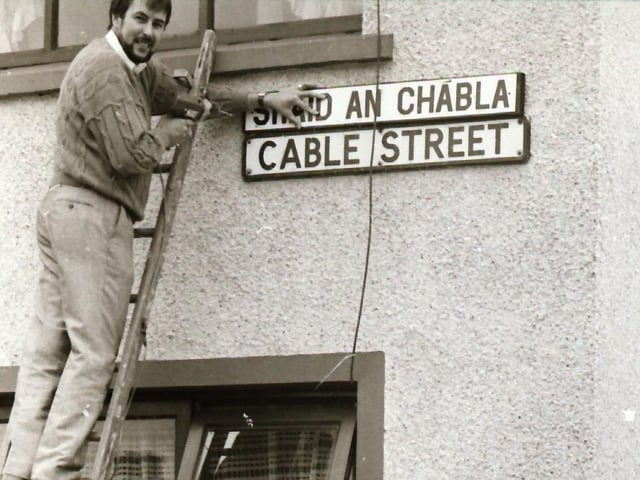 Sinn Féin erect street signs in Irish.