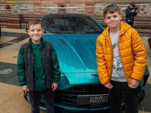 Matvii and Dima from Ukraine. Derry City and Strabane District Council Mayor, Councillor Lilian Seenoi-Barr has hosted Supercar Saturday in Guildhall Square to raise money for the Mayoral Charity Bud Club. The event attracted car enthusiasts and owners from across the region to support aid the local charity. Picture Martin McKeown. 24.05.25