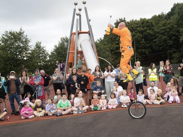 STUNT MASTER. . . . .Jitterbug on the unicycle does a tour of the audience. : .