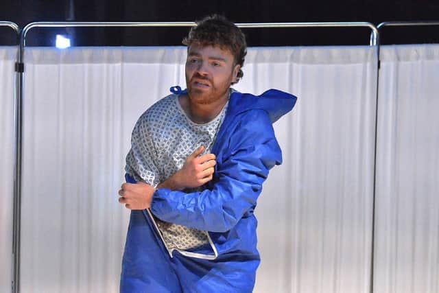 John, who has died by suicide, appears in the mortuary in a liminal space between life and death in Jonathan Burgess’s play Forever and Ever at New Gate Arts and Culture Centre.  Photo: George Sweeney