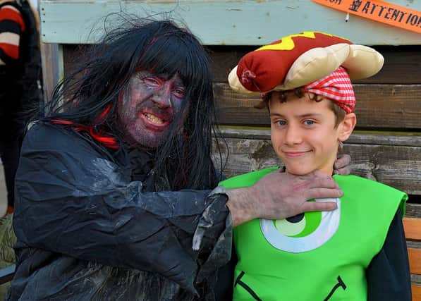 Harry Connaughton with his dad Henry at the Mullan Hope Centre’s Spooky Halloween Markets, in Moville, on Sunday evening last.  Photo: George Sweeney.  DER2244GS – 058