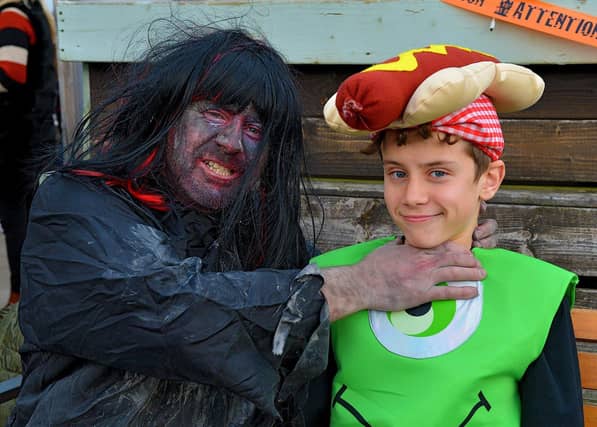 Harry Connaughton with his dad Henry at the Mullan Hope Centre’s Spooky Halloween Markets, in Moville, on Sunday evening last. Photo: George Sweeney. DER2244GS – 058