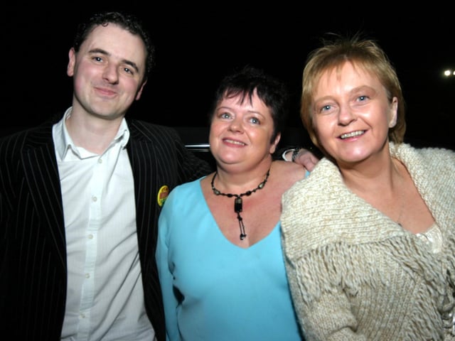 Birthday boy Brian smiles for the camera with, Miriam and Edel 0044/JML : Parties and celebrations January 2006: Brian Beattie.