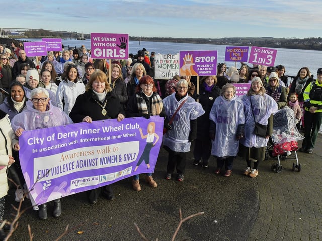 Proponents who participated in the Foyle Women’s Aid walk, from Sainsbury’s to the Guildhall on Sunday afternoon, supporting the United Nations Women’s Campaign to eliminate gender – based violence worldwide. Photo: George Sweeney