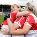 Derry's Lauren McKenna, Rachel Downey and goalkeeper Laura Coyle celebrate at the final whistle of the 2023 Glen Dimplex All-Ireland Intermediate Camogie Championship in FBD Semple Stadium, Tipperary. (©INPHO/Laszlo Geczo)