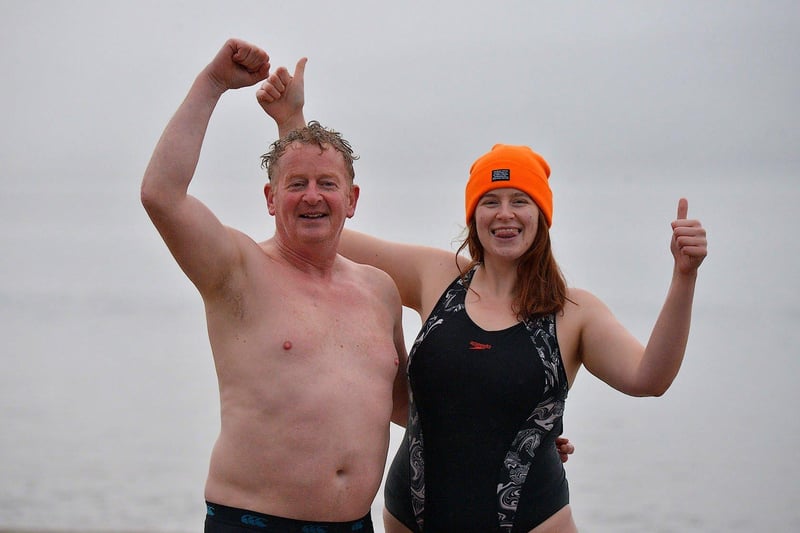 Simon Seehan and his daughter Rua took part in the annual Christmas morning charity swim at Ludden beach, Buncrana. Photo: George Sweeney. DER2252GS – 20