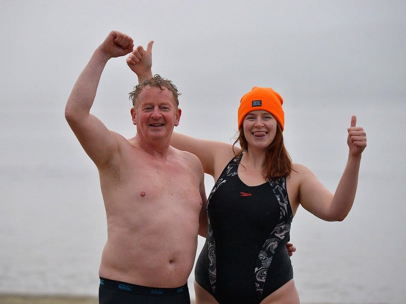 Simon Seehan and his daughter Rua took part in the annual Christmas morning charity swim at Ludden beach, Buncrana. Photo: George Sweeney. DER2252GS – 20