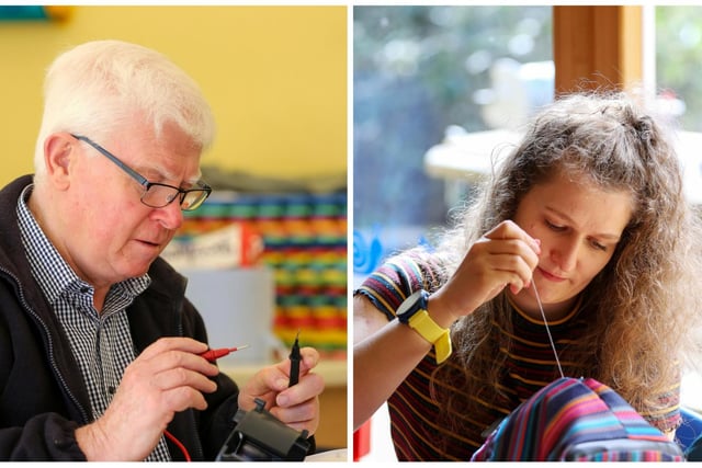 Volunteer Stewart Wright fixes electrical items and volunteer Elisia Gormley at the textile repair station.