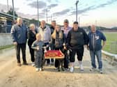 Joseph (Joe) Hurley Memorial 500 winner 'Shrewd Stories' with owner Dermot Coney who is standing behind his daughter Ella (holding the dog) and accepting the trophy from Zakk McMeekin.  Included are Joe Hurley Snr, Ivan Fleck & Ann, Barry Holland, Chontelle McMeekin and Mark McCallion.