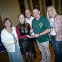 The Mayor of Derry City and Strabane District Council, presenting the Sports Star award to Gareth Warren at Thursday night's DCSDC Sports Awards. Included are members of Gareth's family. (Photos: Jim McCafferty Photography)