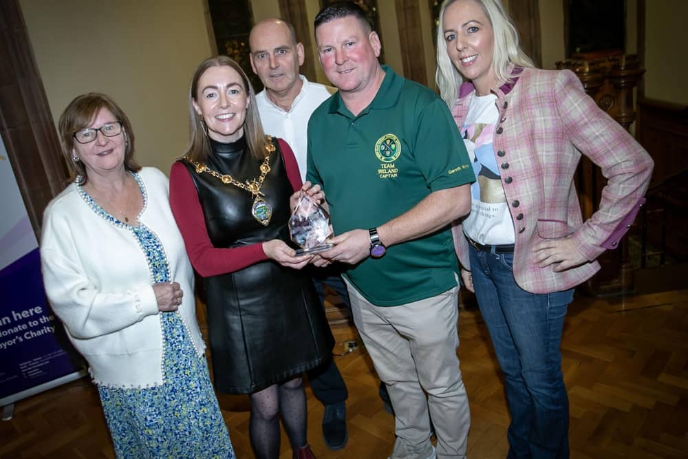 The Mayor of Derry City and Strabane District Council, presenting the Sports Star award to Gareth Warren at Thursday night's DCSDC Sports Awards. Included are members of Gareth's family. (Photos: Jim McCafferty Photography)
