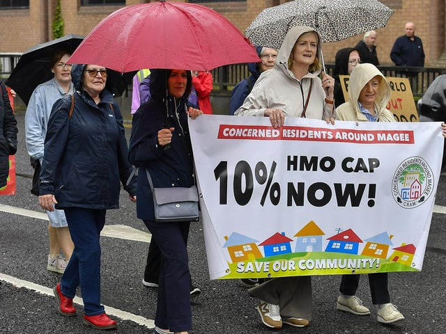 Participants carry banners during the Derry Housing Action Committee protest march over housing crisis on Saturday afternoon Photo: George Sweeney