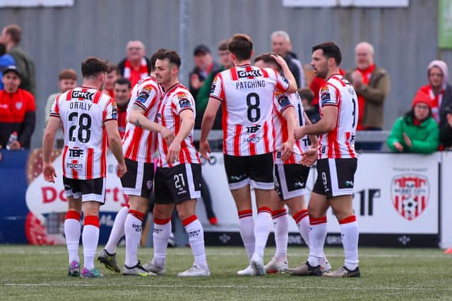 Derry City players celebrate at Brandywell as Danny Mullen gets them up and running against St Patrick's Athletic. Photographs by Kevin Moore.