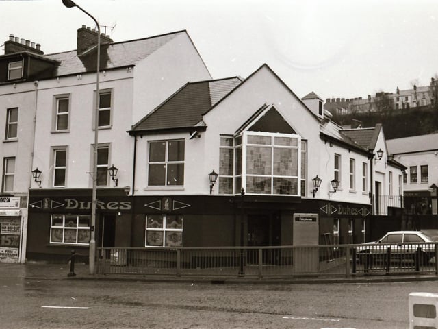 Staff and customers at Duke's Bar in the Waterside.