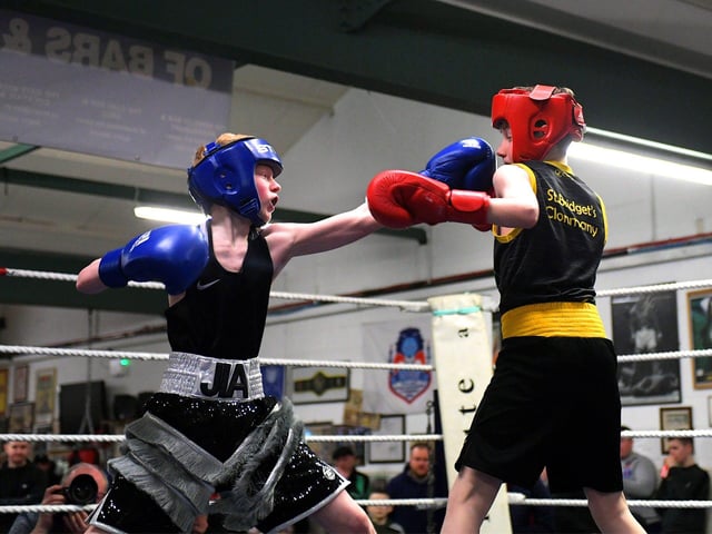 Oakleaf’s Joshua Cairns, left, boxing Clonmany’s Liam Weatherall.  Photo: George Sweeney