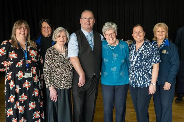 L-R: Participants at the Millennium Forum Tea Dance pictured with Shona Mc Eleney (Glendermott Medical Practice), Lisa Heaney (Millennium Forum), Dougie Breslin, Amanda Kennedy (Millennium Forum) and Rosemary McBrearty (Millennium Forum) pictured at a recent Dementia Friendly Tea Dance.