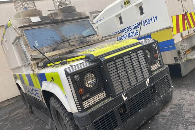 A scorch damaged PSNI Land Rover that was struck with a petrol bomb in Creggan on Thursday.