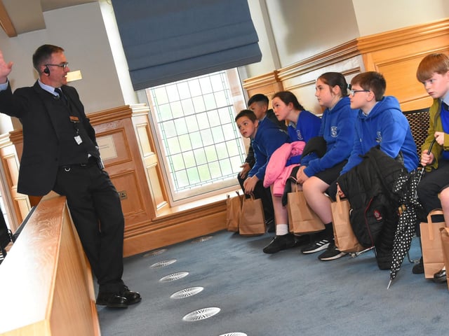Nazareth House PS School Council on a tour of the Guildhall with Chris Walker.