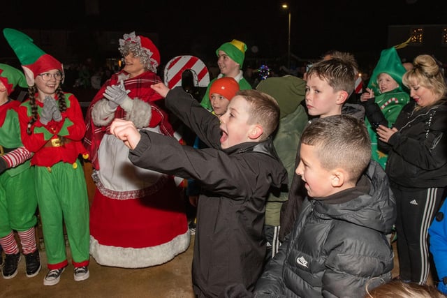 Children show their excitement as Santa makes an appearance at the Christmas Lights switch on with the Mayor at Amelia Court. Picture Martin McKeown. 01.12.23